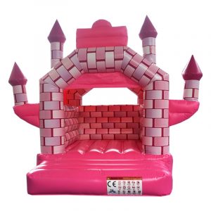 Château gonflable de princesse rose avec ses tours de conte de fée rigolotes